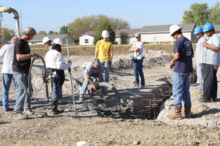 Students Working on Concrete Footings at Athletic Complex Facility
