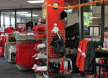 Inside View of the CCC Bookstore Showing a Wide Variety of Red Raven Merchandise 